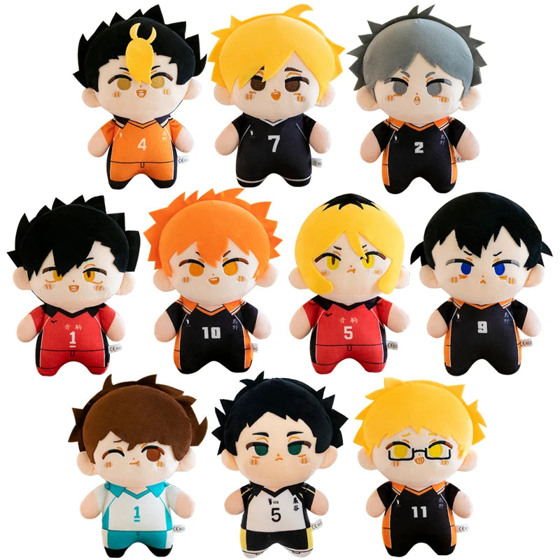 Collection of plush toys with various hairstyles and outfits on a white background
